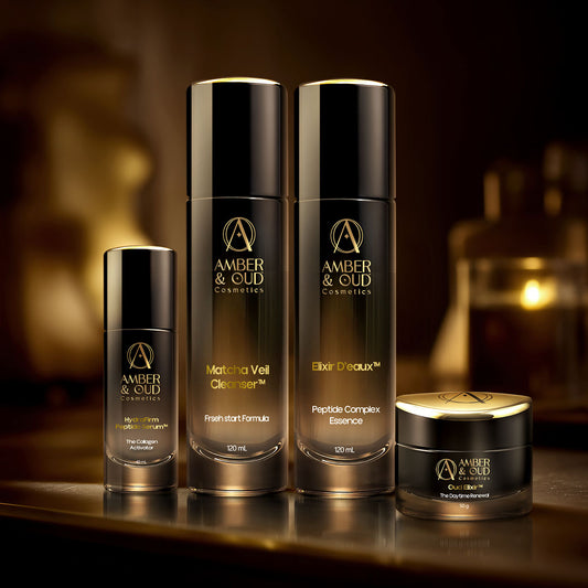 Amber & Oud cosmetic products on a dark background