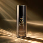 Amber & Oud Cosmetics serum bottle on a warm brown background