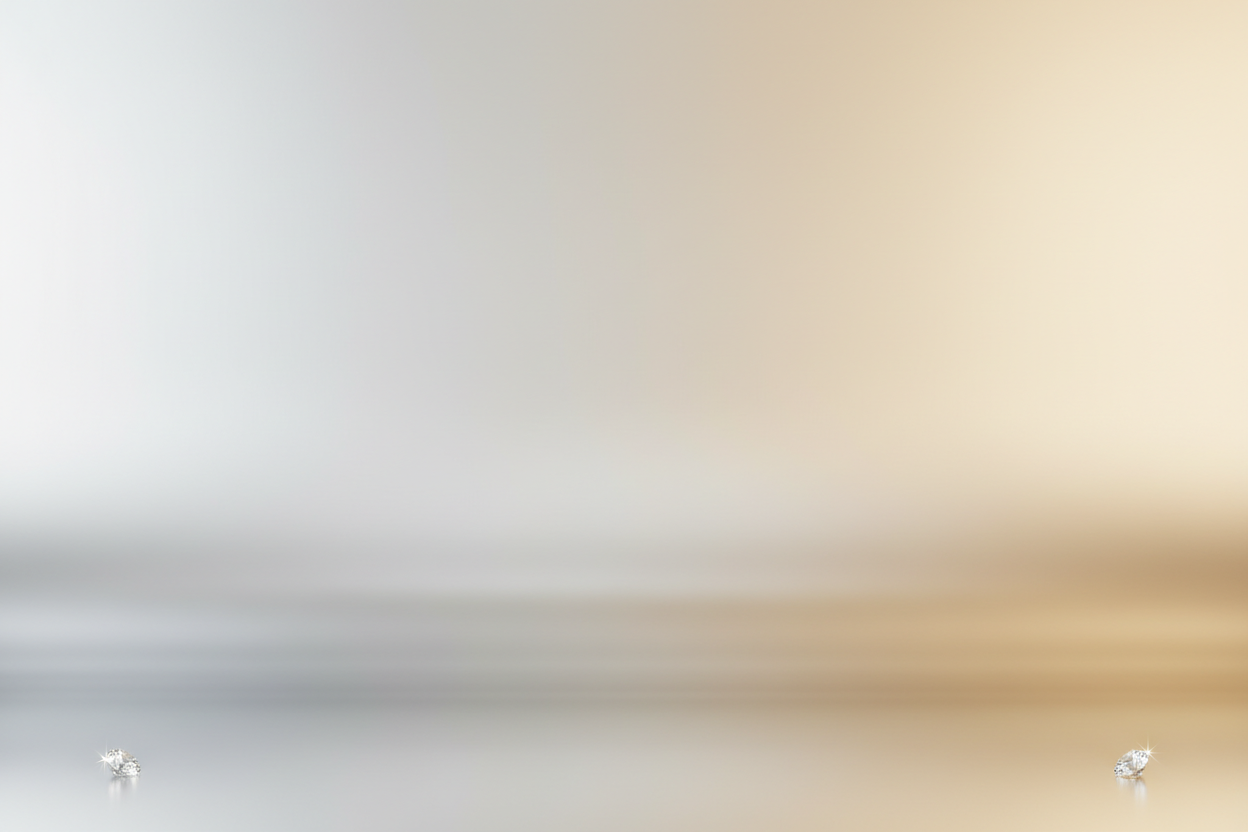 Create an elegant luxury background with a smooth silver-to-soft-gold gradient, similar to a studio beauty backdrop. Add two subtle, small diamonds positioned low on each side near the bottom edge. Ensure the mid-upper area remains completely empty for product placement. Use soft shadows, diffused lighting, and a clean, refined surface. No text, no bottles, no containers, no labels, no logos — only the background and the diamonds.